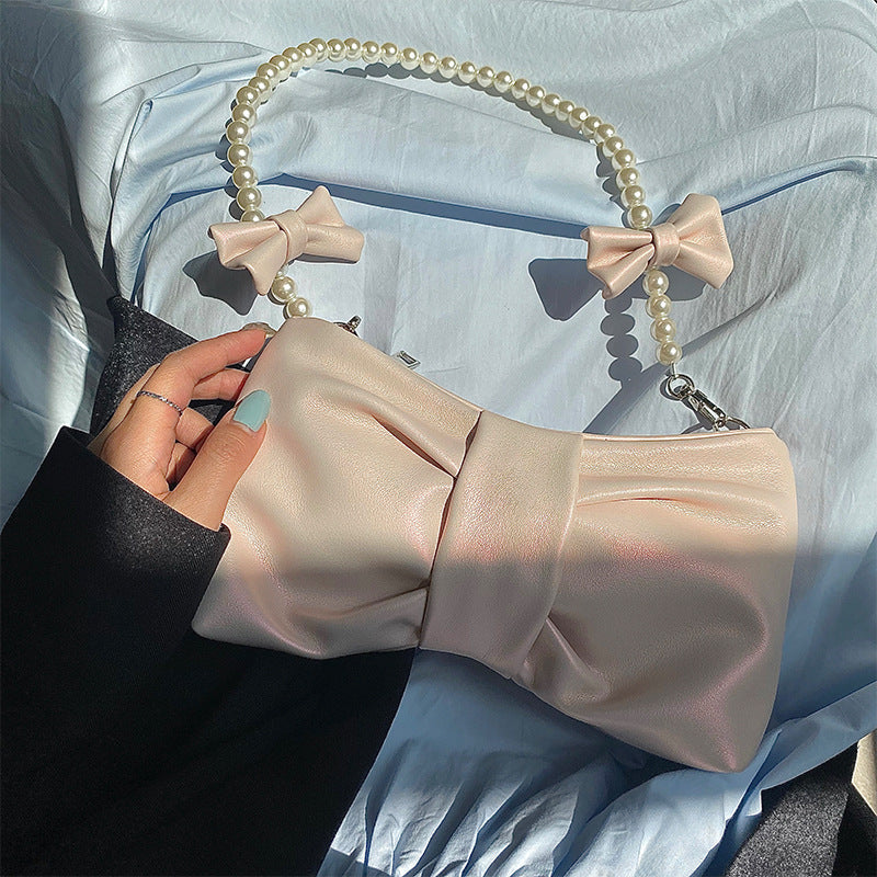 Sarah - Stilvolle Clutch mit Perlengriff für feminine Eleganz