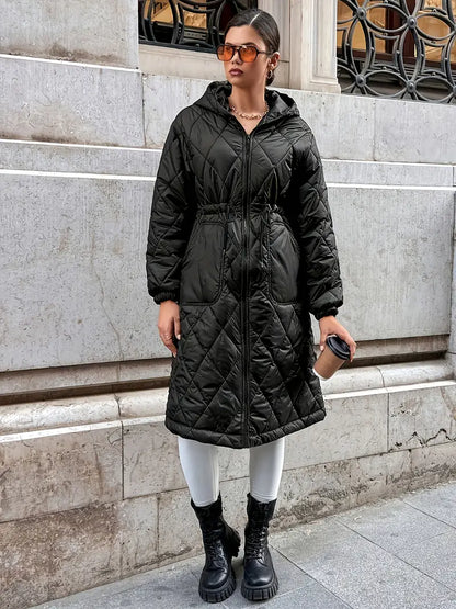 Keynaris | Gemütliche Oase – Pufferjacke in Midilänge mit Kapuze