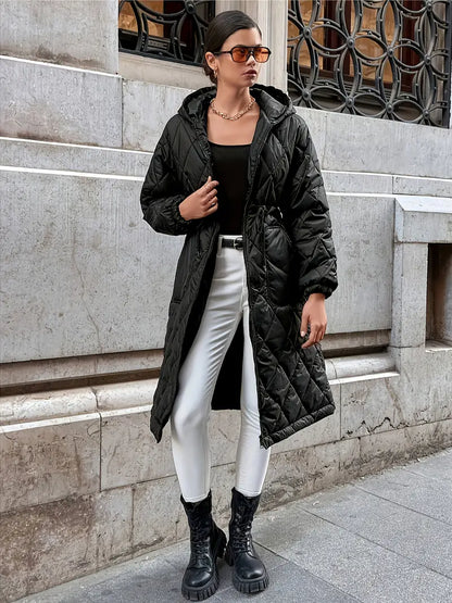 Keynaris | Gemütliche Oase – Pufferjacke in Midilänge mit Kapuze